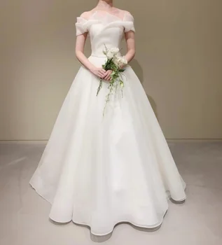 2023 Új design elefántcsont esküvői ruha vállon kívüli földhosszú rövid ujjú Organza 웨딩드레스 A-vonalú hát nélküli koreai menyasszonyi ruhák