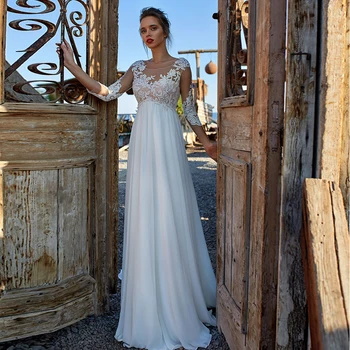 A-Line sifon esküvői ruhák 3/4 ujjú csipke rátétek gomb Nyári tengerparti menyasszonyi ruhák Földhossz O-nyak Vestidos De Noiva