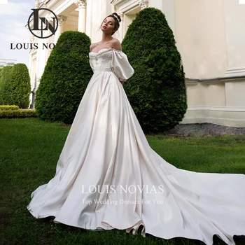 LOUIS NOVIAS Báli ruha Szatén esküvői ruha 2023 Luxus pezsgős puffos ujjú gyöngyfűző kedvesem esküvői ruha Vestidos De Novia